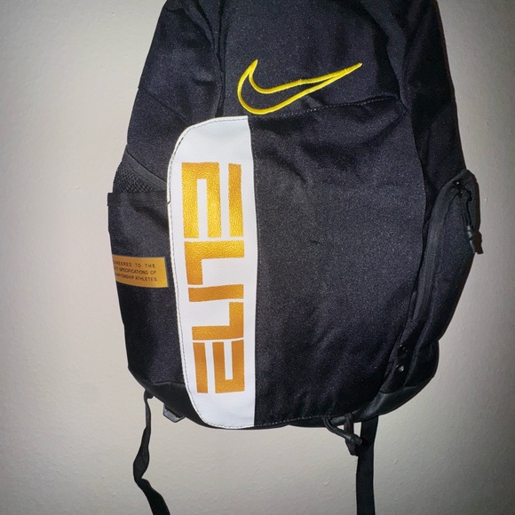 gold and black nike backpack Hoops Elite Pro giving it a bold and stylish look Vintage 90s Nike Backpack -